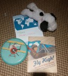 Eloise uses these props while reading Fly High!